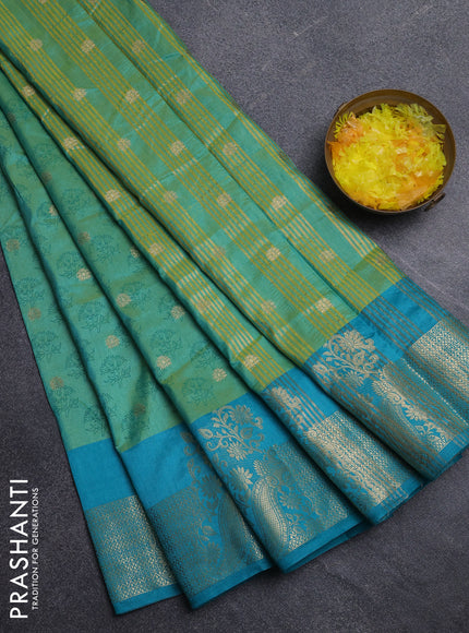 Semi raw silk saree dual shade of light green and teal green with allover floral butta prints & 1000 zari buttas and zari woven border