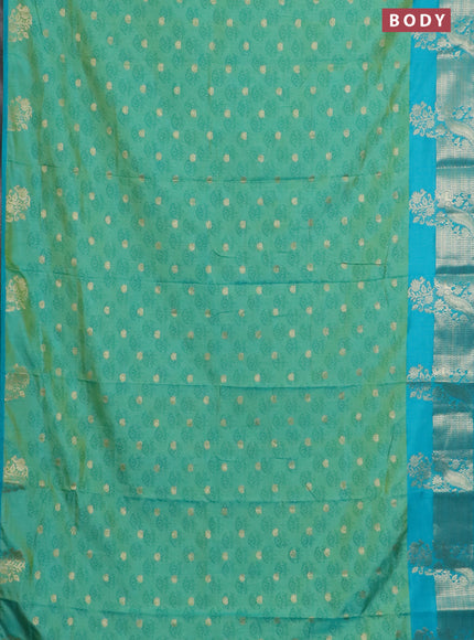 Semi raw silk saree dual shade of light green and teal green with allover floral butta prints & 1000 zari buttas and zari woven border