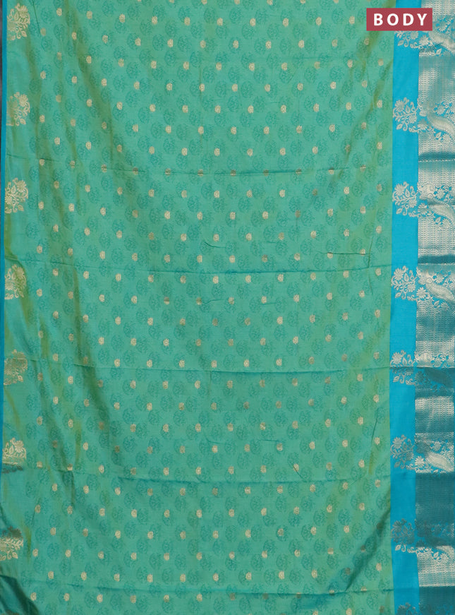 Semi raw silk saree dual shade of light green and teal green with allover floral butta prints & 1000 zari buttas and zari woven border