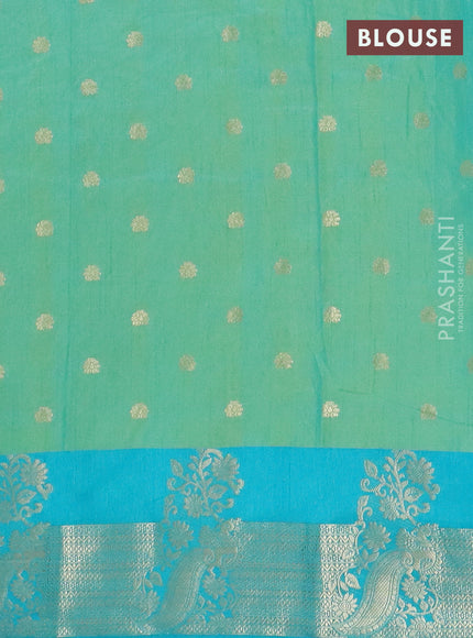 Semi raw silk saree dual shade of light green and teal green with allover floral butta prints & 1000 zari buttas and zari woven border