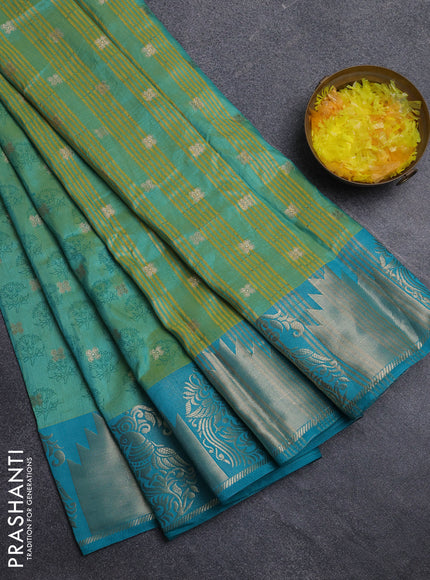 Semi raw silk saree dual shade of teal bluish green and teal green with allover floral butta prints & 1000 zari buttas and zari woven border