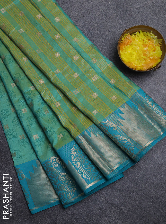 Semi raw silk saree dual shade of teal bluish green and teal green with allover floral butta prints & 1000 zari buttas and zari woven border