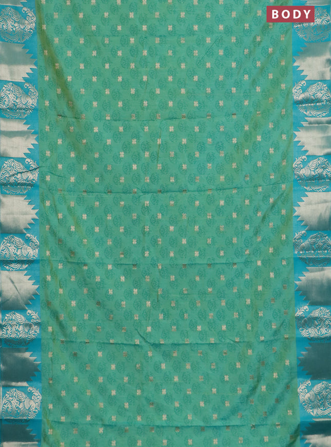 Semi raw silk saree dual shade of teal bluish green and teal green with allover floral butta prints & 1000 zari buttas and zari woven border