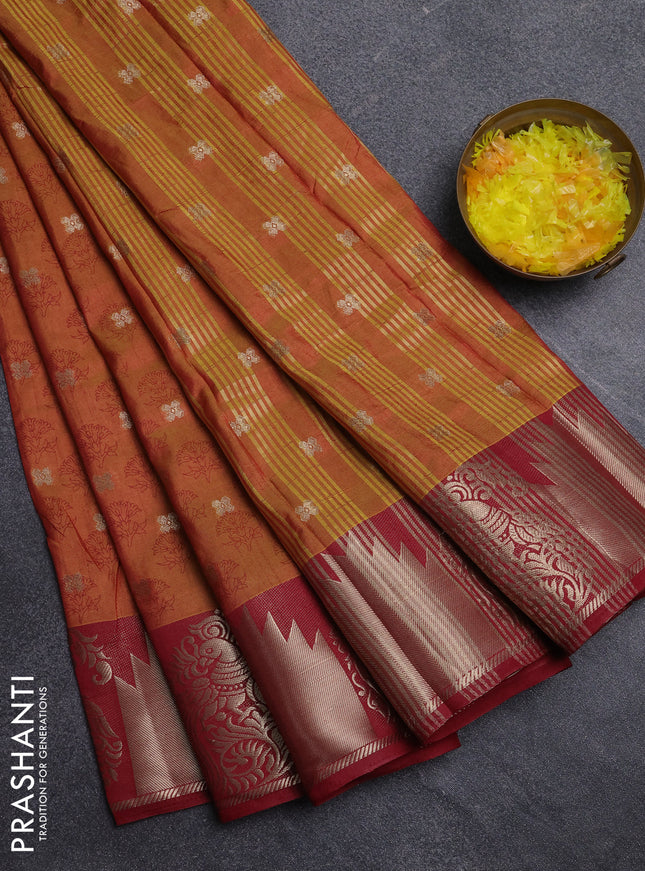 Semi raw silk saree dark mustard and maroon with allover floral butta prints & 1000 zari buttas and zari woven border