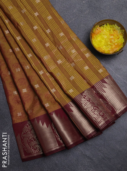 Semi raw silk saree dark mustard green and wine shade with allover floral butta prints & 1000 zari buttas and zari woven border