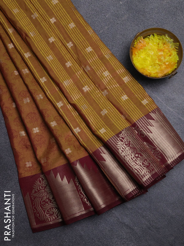 Semi raw silk saree dark mustard green and wine shade with allover floral butta prints & 1000 zari buttas and zari woven border