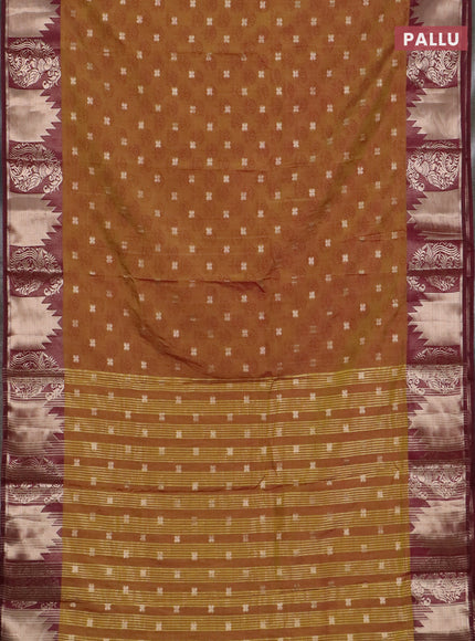 Semi raw silk saree dark mustard green and wine shade with allover floral butta prints & 1000 zari buttas and zari woven border