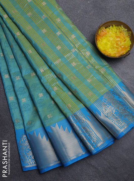 Semi raw silk saree dual shade of teal blue and cs blue with allover floral butta prints & 1000 zari buttas and zari woven border