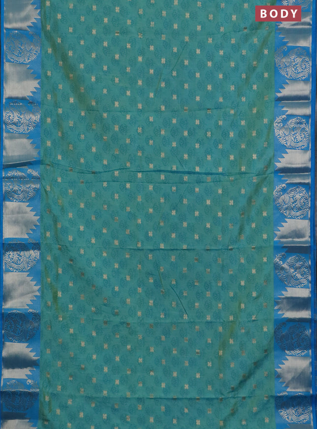 Semi raw silk saree dual shade of teal blue and cs blue with allover floral butta prints & 1000 zari buttas and zari woven border