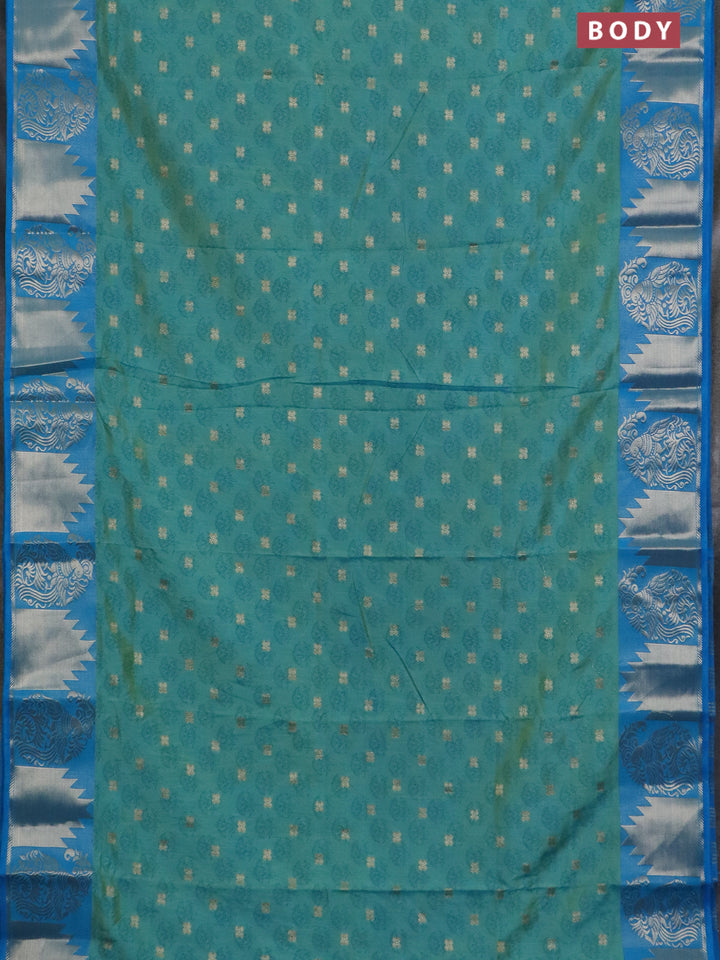 Semi raw silk saree dual shade of teal blue and cs blue with allover floral butta prints & 1000 zari buttas and zari woven border