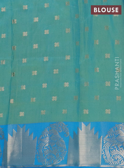 Semi raw silk saree dual shade of teal blue and cs blue with allover floral butta prints & 1000 zari buttas and zari woven border