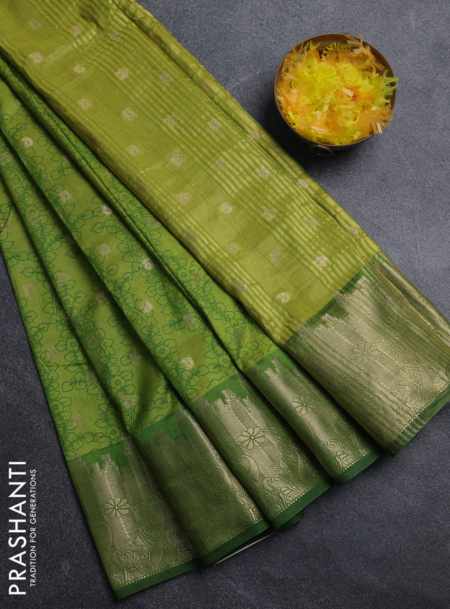 Semi raw silk saree light green and green with allover kalamkari prints & 1000 zari buttas and zari woven border
