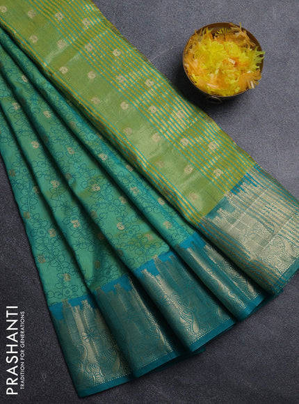 Semi raw silk saree dual shade of teal bluish green and teal green with allover kalamkari prints & 1000 zari buttas and zari woven border