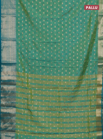 Semi raw silk saree teal bluish green and teal green with allover floral butta prints & 1000 zari buttas and zari woven border