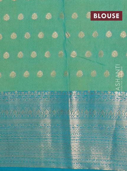 Semi raw silk saree teal bluish green and teal green with allover floral butta prints & 1000 zari buttas and zari woven border