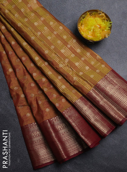 Semi raw silk saree dark mustard and maroon with allover floral butta prints & 1000 zari buttas and zari woven border