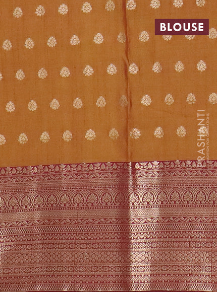 Semi raw silk saree dark mustard and maroon with allover floral butta prints & 1000 zari buttas and zari woven border