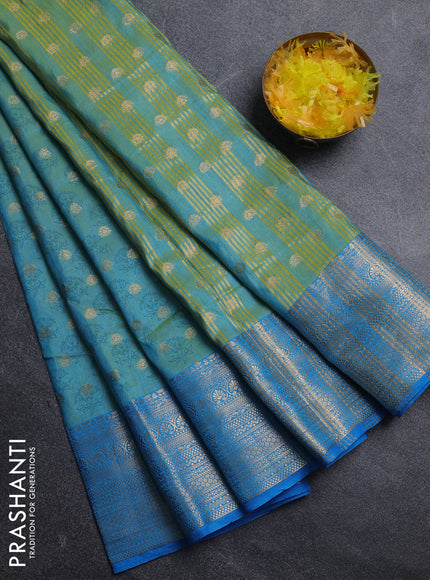 Semi raw silk saree dual shade ot teal blue and cs blue with allover floral butta prints & 1000 zari buttas and zari woven border
