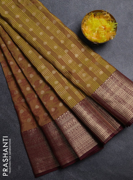 Semi raw silk saree dark mustard green and wine shade with allover floral butta prints & 1000 zari buttas and zari woven border