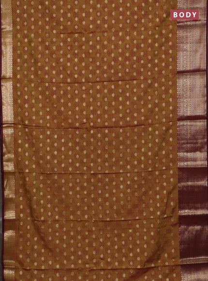 Semi raw silk saree dark mustard green and wine shade with allover floral butta prints & 1000 zari buttas and zari woven border