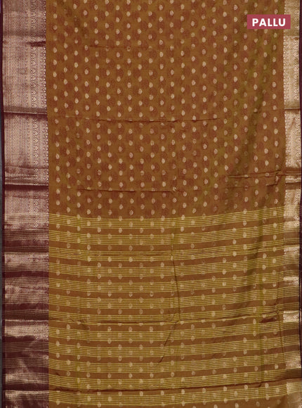 Semi raw silk saree dark mustard green and wine shade with allover floral butta prints & 1000 zari buttas and zari woven border