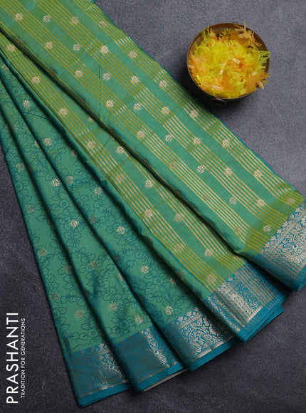 Semi raw silk saree dual shade of teal bluish green and teal blue shade with allover kalamkari prints & 1000 zari buttas and zari woven border