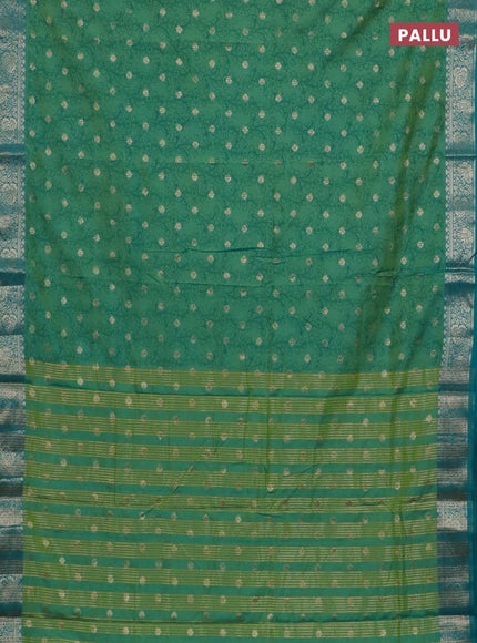 Semi raw silk saree dual shade of teal bluish green and teal blue shade with allover kalamkari prints & 1000 zari buttas and zari woven border
