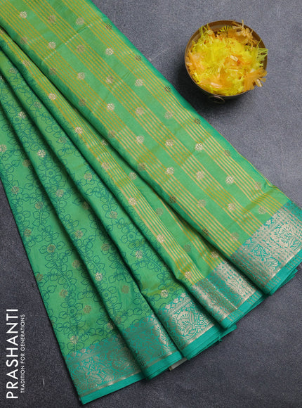 Semi raw silk saree dual shade of teal green and teal green with allover kalamkari prints & 1000 zari buttas and zari woven border