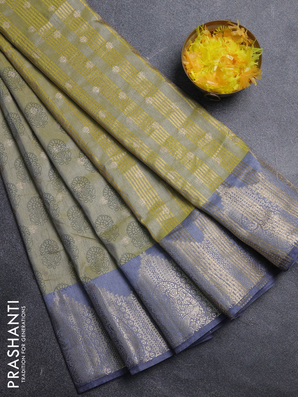 Semi raw silk saree elaichi green and grey with allover floral butta prints & 1000 zari buttas and temple design zari woven border