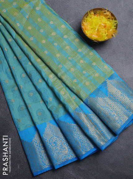 Semi raw silk saree dual shade of teal bluish green and cs blue with allover floral butta prints & 1000 zari buttas and temple design zari woven border