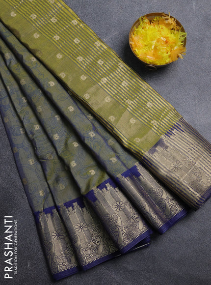 Semi raw silk saree dual shade of mehendi green and navy blue with allover kalamkari prints & 1000 zari buttas and zari woven border