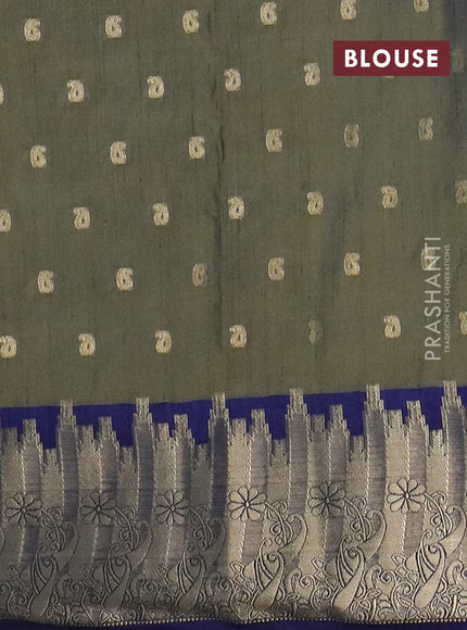 Semi raw silk saree dual shade of mehendi green and navy blue with allover kalamkari prints & 1000 zari buttas and zari woven border