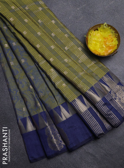Semi raw silk saree sap green and navy blue with allover kalamkari prints & 1000 zari buttas and temple design zari butta border
