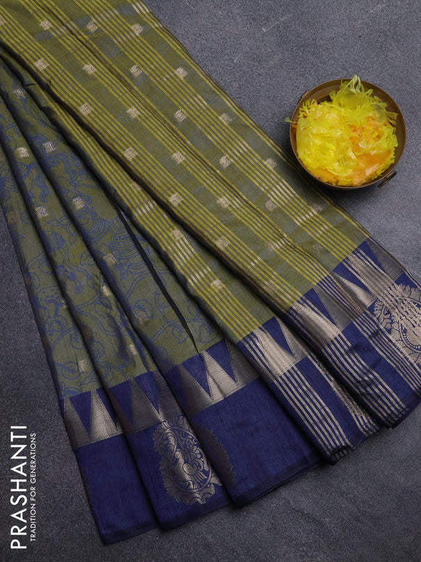 Semi raw silk saree sap green and navy blue with allover kalamkari prints & 1000 zari buttas and temple design zari butta border