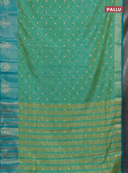 Semi raw silk saree teal bluish green and teal green shade with allover prints & 1000 zari buttas and zari woven border