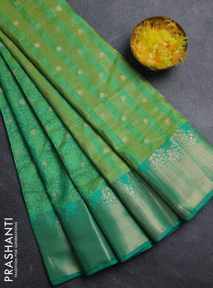 Semi raw silk saree dual shade of teal bluish green and teal green with allover kalamkari prints & 1000 zari buttas and zari woven border