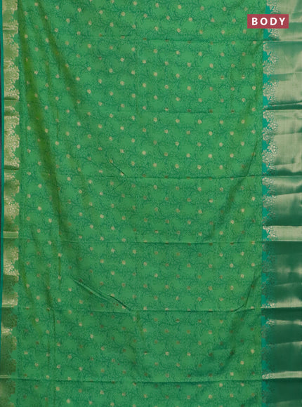 Semi raw silk saree dual shade of teal bluish green and teal green with allover kalamkari prints & 1000 zari buttas and zari woven border