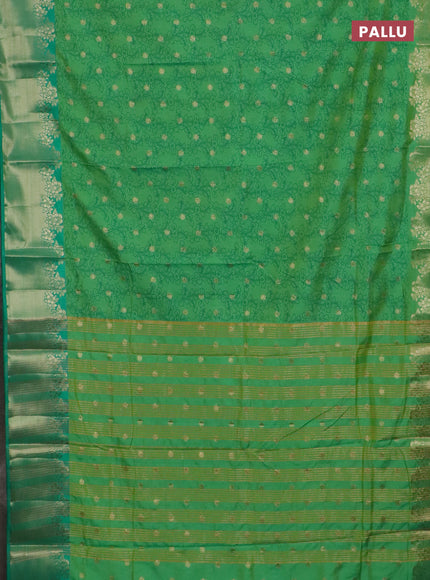 Semi raw silk saree dual shade of teal bluish green and teal green with allover kalamkari prints & 1000 zari buttas and zari woven border