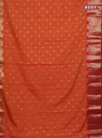 Semi raw silk saree dual shade of orange and red with allover kalamkari prints & 1000 zari buttas and zari woven border