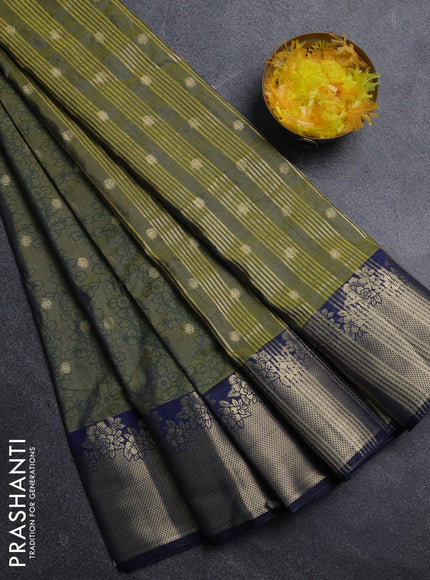 Semi raw silk saree dual shade of mehendi green and navy blue with allover kalamkari prints & 1000 zari buttas and zari woven border