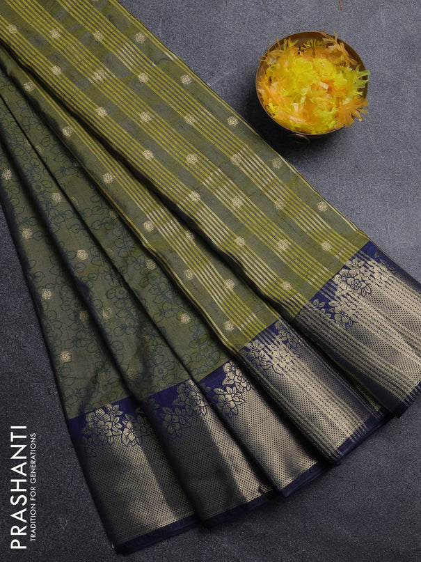 Semi raw silk saree dual shade of mehendi green and navy blue with allover kalamkari prints & 1000 zari buttas and zari woven border