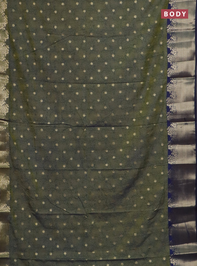 Semi raw silk saree dual shade of mehendi green and navy blue with allover kalamkari prints & 1000 zari buttas and zari woven border