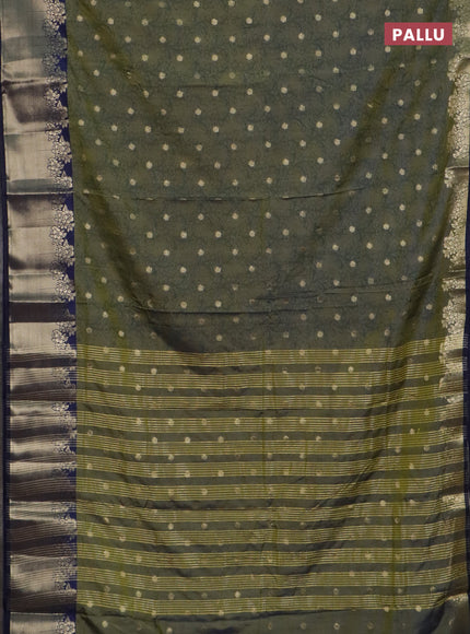 Semi raw silk saree dual shade of mehendi green and navy blue with allover kalamkari prints & 1000 zari buttas and zari woven border