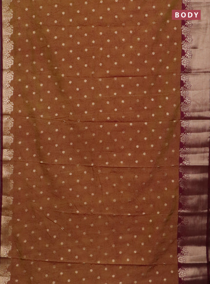 Semi raw silk saree dual shade of dark mustard green and wine shade with allover kalamkari prints & 1000 zari buttas and zari woven border