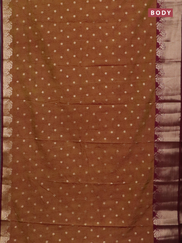 Semi raw silk saree dual shade of dark mustard green and wine shade with allover kalamkari prints & 1000 zari buttas and zari woven border