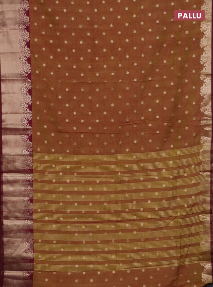 Semi raw silk saree dual shade of dark mustard green and wine shade with allover kalamkari prints & 1000 zari buttas and zari woven border