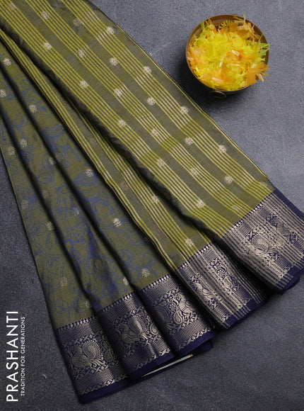 Semi raw silk saree sap green and navy blue with allover kalamkari prints & 1000 zari buttas and zari woven border