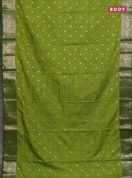 Semi raw silk saree light green with allover kalamkari prints & 1000 zari buttas and zari woven border