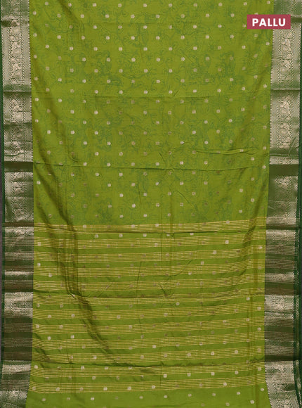 Semi raw silk saree light green with allover kalamkari prints & 1000 zari buttas and zari woven border