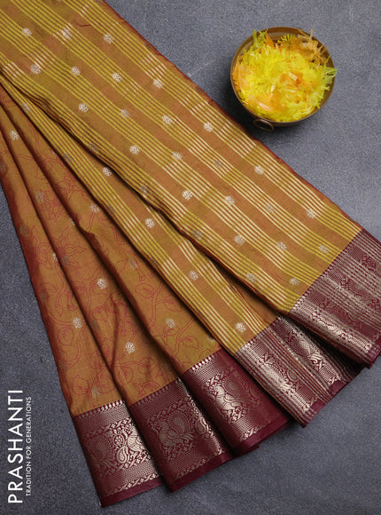 Semi raw silk saree dark mustard and maroon with allover kalamkari prints & 1000 zari buttas and zari woven border
